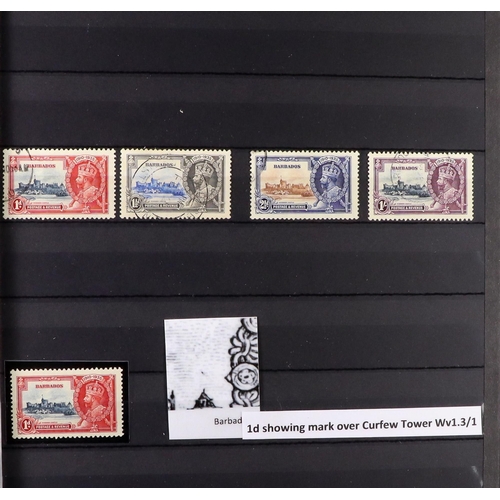 46 - 1935 SILVER JUBILEE ISSUE SPECIALIZED COLLECTION in 2 large stock books, includes mint (almost entir... 