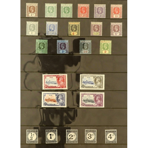 558 - FIJI 1912 - 1935 MINT COLLECTION of 64 stamps on protective pages, complete for the basic stamps wit... 