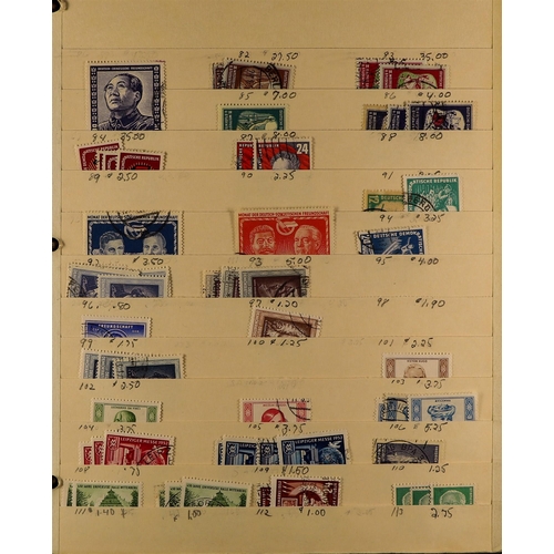 696 - GERMANY EAST 1949 - 1990 IN THREE BIG BINDERS chiefly used stamps on old manilla stock pages in 3 bi... 