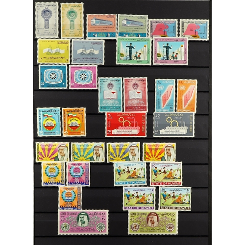 886 - KUWAIT 1965 - 1977 NEVER HINGED MINT collection with 100+ sets, in stock book. Stc £1300+ (450+ stam... 