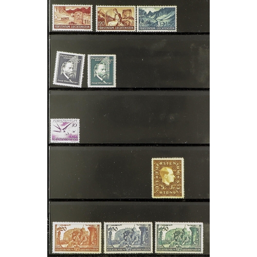 895 - LIECHTENSTEIN 1912 - 1959 ASSORTMENT of several 100 stamps on protective & album pages, note (all mi... 