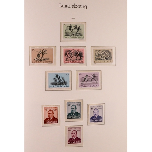 906 - LUXEMBOURG 1945-1986 COMPLETE NEVER HINGED MINT COLLECTION in hingeless Lighthouse album, includes 1... 