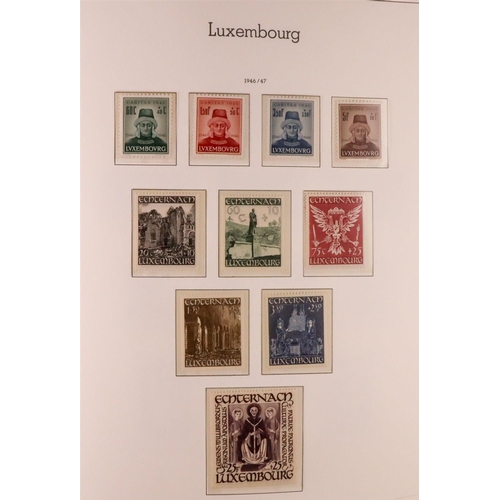 906 - LUXEMBOURG 1945-1986 COMPLETE NEVER HINGED MINT COLLECTION in hingeless Lighthouse album, includes 1... 