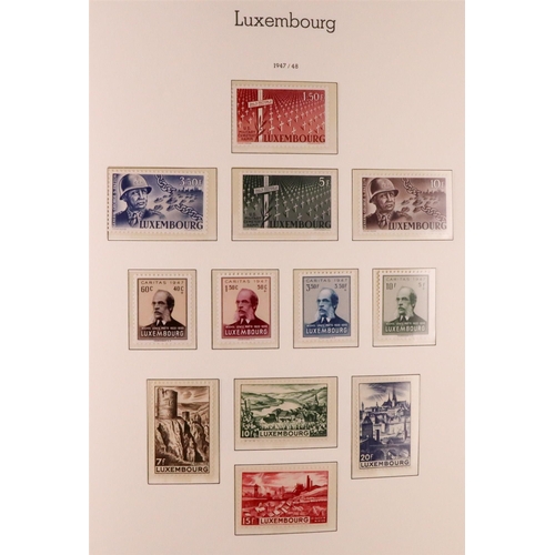 906 - LUXEMBOURG 1945-1986 COMPLETE NEVER HINGED MINT COLLECTION in hingeless Lighthouse album, includes 1... 