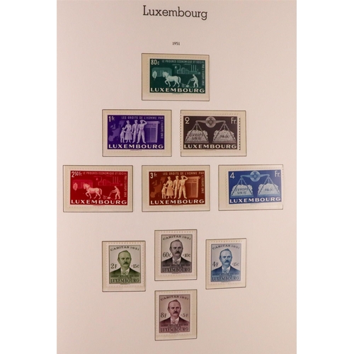 906 - LUXEMBOURG 1945-1986 COMPLETE NEVER HINGED MINT COLLECTION in hingeless Lighthouse album, includes 1... 