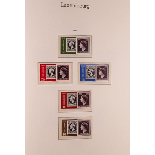 906 - LUXEMBOURG 1945-1986 COMPLETE NEVER HINGED MINT COLLECTION in hingeless Lighthouse album, includes 1... 