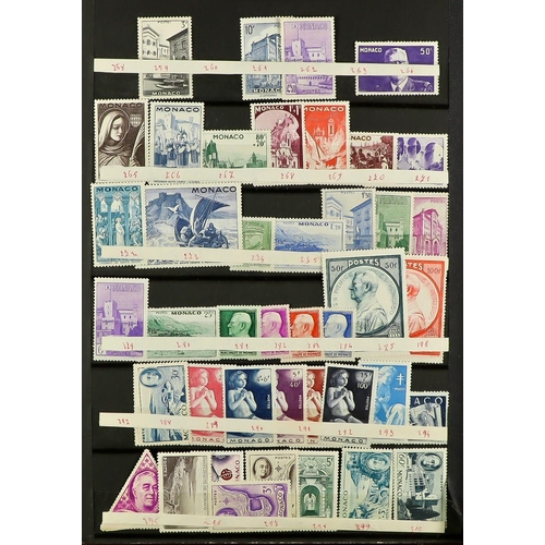 960 - MONACO 1941 - 1976 NEVER HINGED MINT in stockbook, near - complete for the period (approx 1,200 stam... 