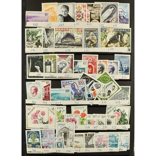 960 - MONACO 1941 - 1976 NEVER HINGED MINT in stockbook, near - complete for the period (approx 1,200 stam... 