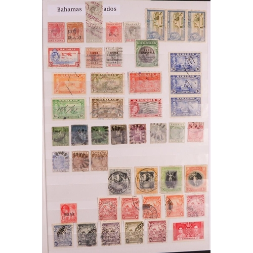 214 - COMMONWEALTH IN STOCK BOOK. Nicely arranged mint & used stamps from 19th Century to 1950's, Aden to ... 