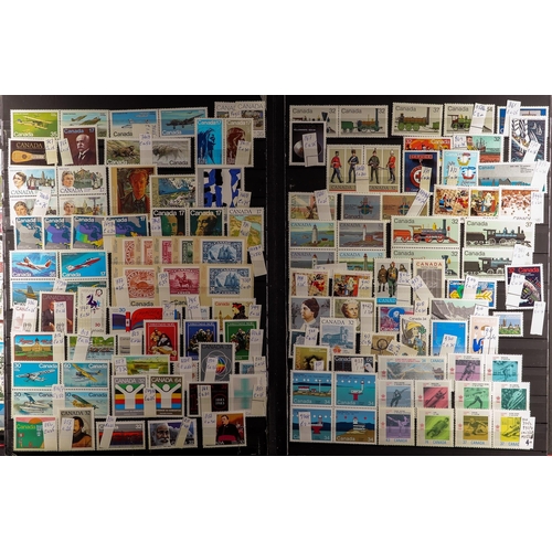 460 - CANADA 1927 - 1998 NEVER HINGED MINT COLLECTION of around 900 stamps, note coils, air mails, Special... 