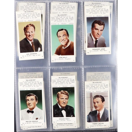 75 - TV AND FILM ASSORTMENT of cigarette cards and photos. Some in albums, on removed pages and loose. (Q... 