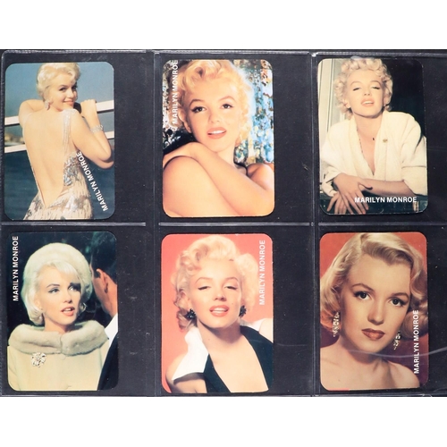 75 - TV AND FILM ASSORTMENT of cigarette cards and photos. Some in albums, on removed pages and loose. (Q... 