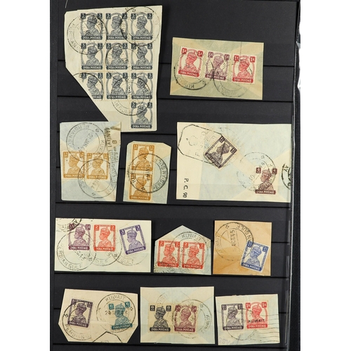 764 - INDIA INDIA USED IN KUWAIT collection of around 60 Indian KGV and KGVI stamps, all tied to pieces by... 