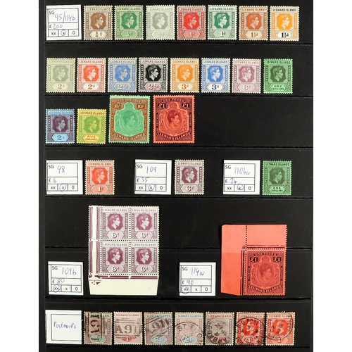 916 - LEEWARD IS. 1890 - 1938 ITEMS & SETS group of around 90 stamps annotated on protective pages, includ... 