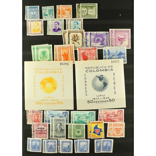 489 - COLOMBIA 1946 - 1963 MINT & USED COMPANION COLLECTIONS in a stock book, near - complete for the mint... 