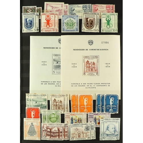 489 - COLOMBIA 1946 - 1963 MINT & USED COMPANION COLLECTIONS in a stock book, near - complete for the mint... 