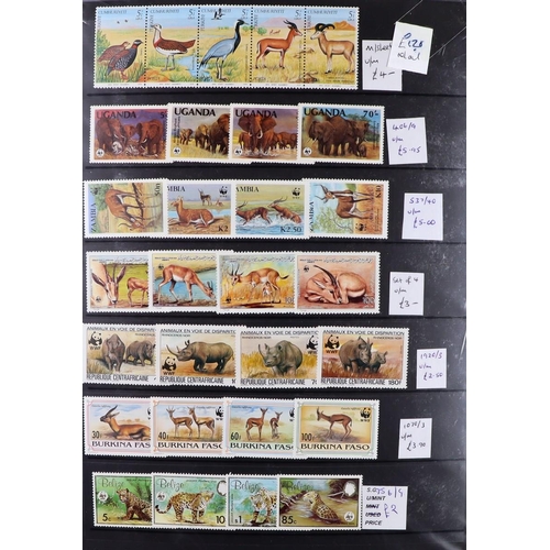 107 - WORLD TOPICAL RETAIL FOLDERS Mostly 1970's-1990's chiefly never hinged mint stamps, sets & mini-shee... 