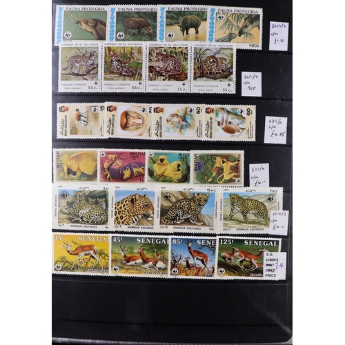 107 - WORLD TOPICAL RETAIL FOLDERS Mostly 1970's-1990's chiefly never hinged mint stamps, sets & mini-shee... 