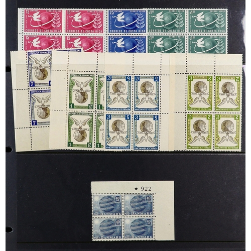 118 - UNIVERSAL POSTAL UNION FOREIGN ISSUES 1949 never hinged mint collection of BLOCKS of 4 and mini-shee... 