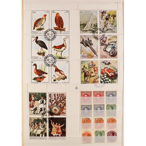 165 - 10 ALBUMS OF WORLD STAMPS includes an SG 