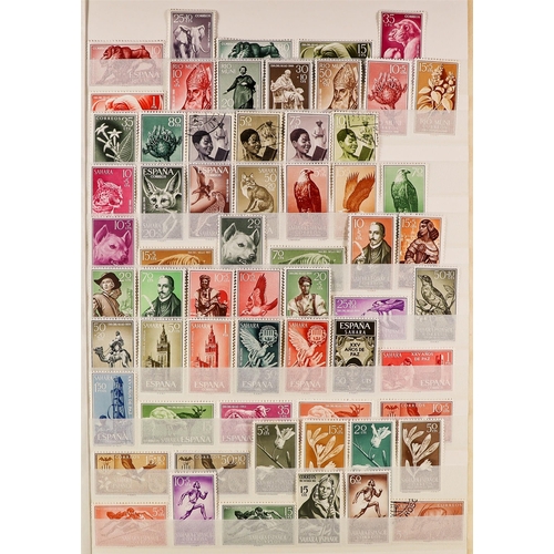 165 - 10 ALBUMS OF WORLD STAMPS includes an SG 