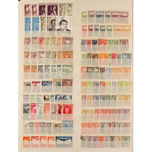 275 - ARGENTINA 1890s - 1990 IN LARGE STOCKBOOK. Thousands of mint and used stamps including 'back of the ... 