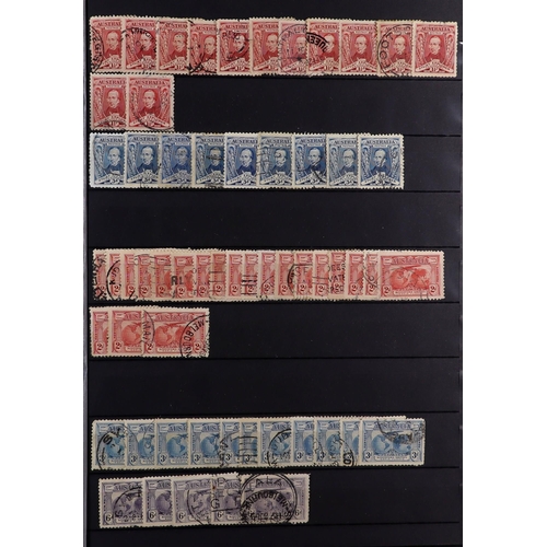 349 - AUSTRALIA KGV 1913 - 1936 DUPLICATED used stamps in a large stock book, chiefly Roos' & Heads, also ... 