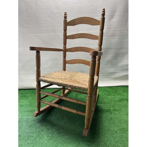 102 - Wooden rocking chair