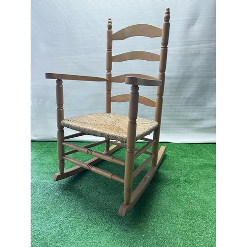 102 - Wooden rocking chair