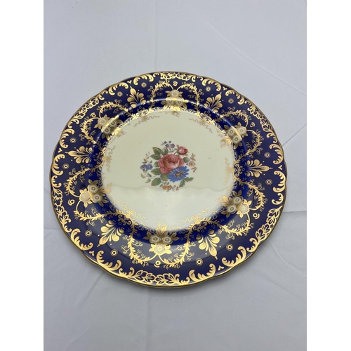 26 - The Aynsley Royalty Dinner Plate in Cobalt Blue is a dinner plate produced by Aynsley China, a well-... 