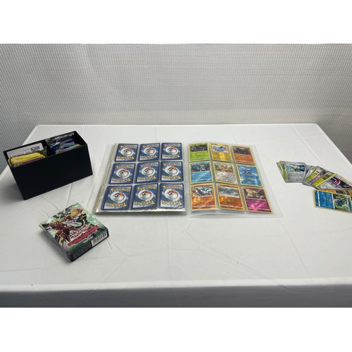 107 - Pokemon Card Bundle including binder of cards, box of cards and large cards with Gengar, Metwo and m... 