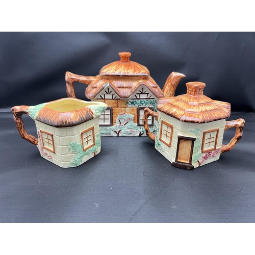 65 - 3 Piece Keele Street Pottery cottage set including milk and suger pots.