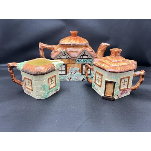 65 - 3 Piece Keele Street Pottery cottage set including milk and suger pots.