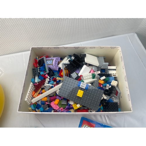 28 - Lego head full of Lego, plus box full of Lego