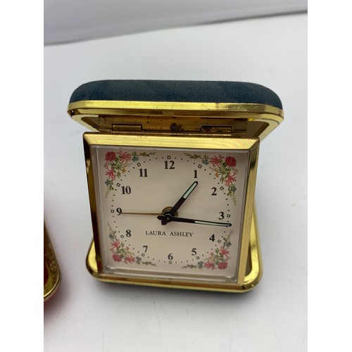 158 - 2 x Travel clocks including one from Laura Ashley