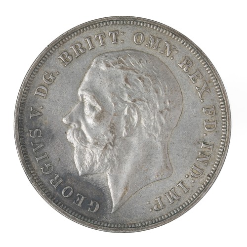 104 - George V, Crown. 1935. (S4048). VF with some black marks