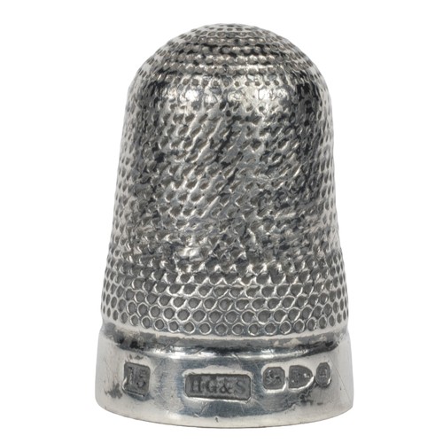 3 - Henry Griffith & Sons Thimble. Chester, 1894. Punched dome and sides with wide silver rim.