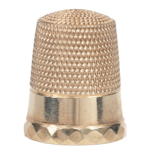 5 - 14K Gold Simon Bros thimble marked with '14K' inside dome along with the 'S' inside of a shield of S... 