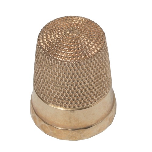 5 - 14K Gold Simon Bros thimble marked with '14K' inside dome along with the 'S' inside of a shield of S... 