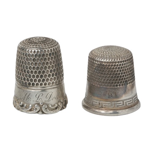 18 - Two American Sterling Silver Thimbles:
1 - Stamped 'Sterling' on band and with Simon Bros. S in shie... 