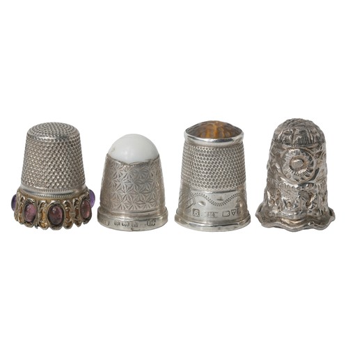 21 - Collection of Four Interesting Thimbles:
1 - Birmingham 1925. White stone top with daisy decorated s... 