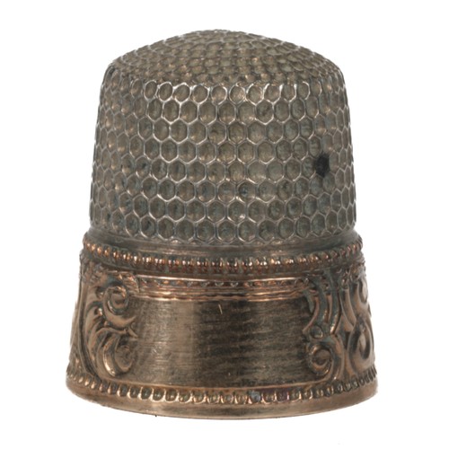 27 - Sterling and Gold Goldsmith Stern & Co Thimble. Decorative gold rim. Marked on inside of dome with m... 