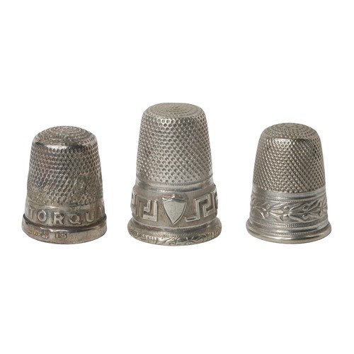 29 - Collection of Three Thimbles:
1 - Henry Griffith & Sons 1930. Marked ' TORQUAY' and 'The Spa'. Damag... 