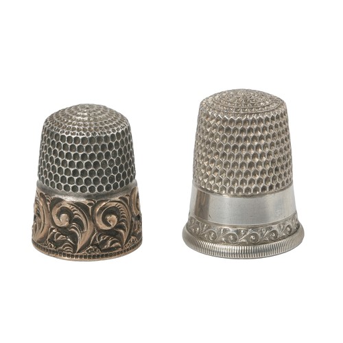 32 - Two American Thimbles by The Simon Bros.
1 - Plain band and wave decoration on band above rim.  Mark... 