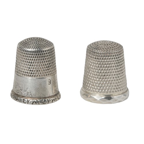 33 - Two American Thimbles by Simon Bros:
1 - Worn design of anchors on rim. Marked inside dome as sterli... 