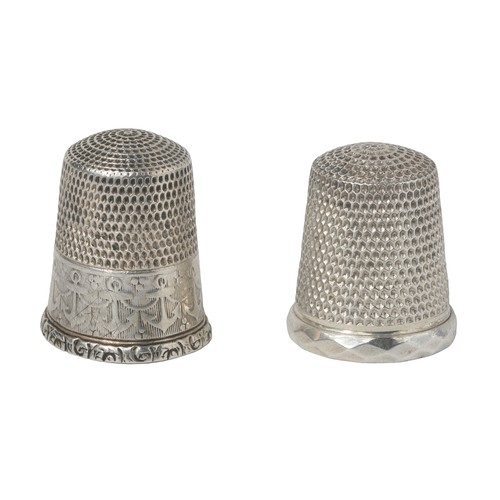 33 - Two American Thimbles by Simon Bros:
1 - Worn design of anchors on rim. Marked inside dome as sterli... 