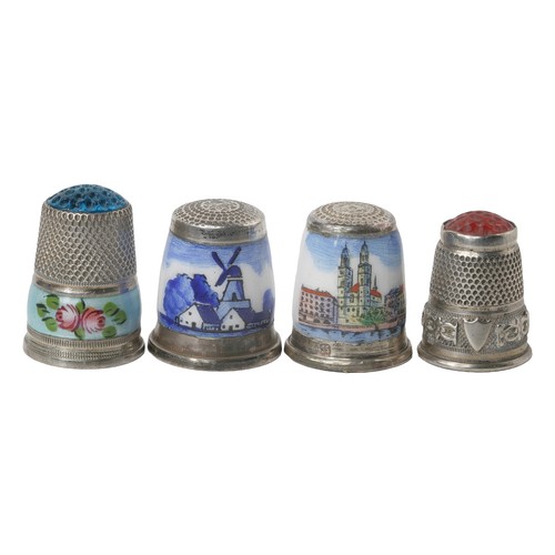 41 - Collection of Four Interesting Thimbles:
1 - Windmill scene on blue and white enamel.  Marked 925.  ... 