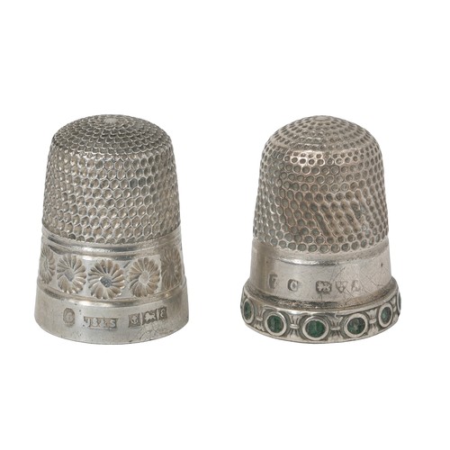 42 - Two Sterling Silver Thimbles:
1 - James Swann & Sons. Birmingham 1954. Band of daisies and plain ban... 