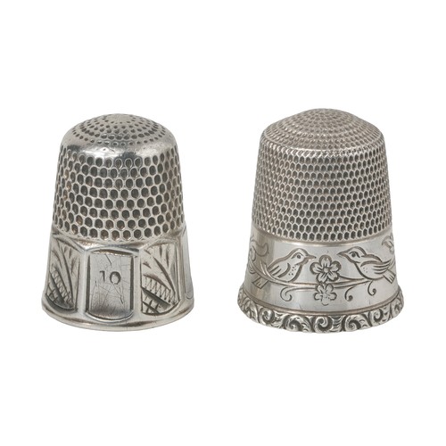 47 - Two American Simon Bros Thimbles:
1 - Decorative band of two birds on a branch with leaves and flowe... 