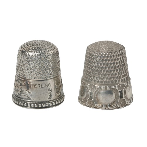 49 - Two American Sterling Silver Thimbles.
1 - Daisy decoration border. Marked sterling, 9 and, in the d... 